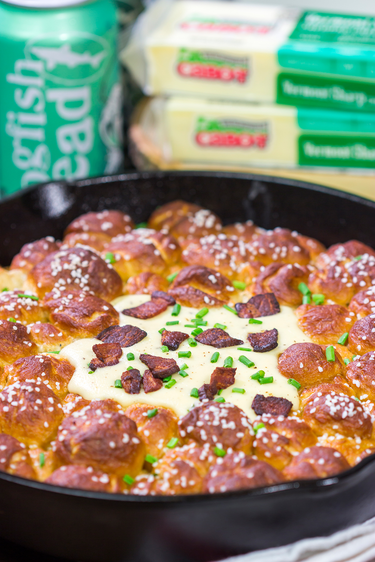 This Pull Apart Pretzel Skillet features warm, soft pretzels served with Beer Cheese. It's the perfect way to celebrate Oktoberfest and Autumn days in general!