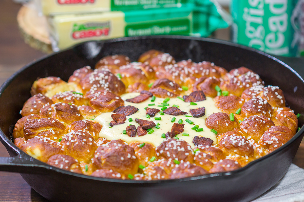 This Pull Apart Pretzel Skillet features warm, soft pretzels served with Beer Cheese. It's the perfect way to celebrate Oktoberfest and Autumn days in general!
