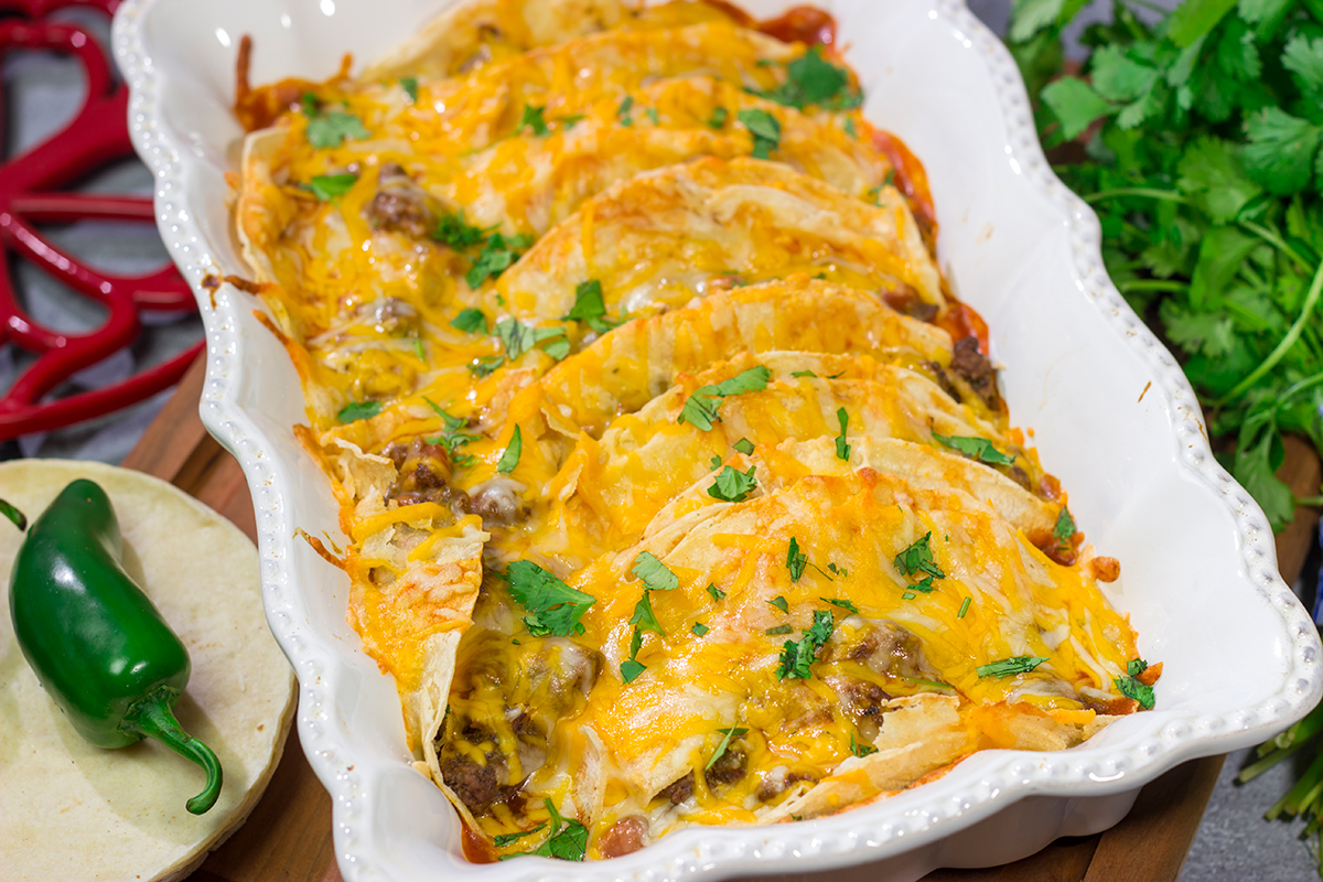 This Beef Enchiladas recipe makes for a fantastic weeknight meal! It's easy to prepare, and it's comfort food at its best!