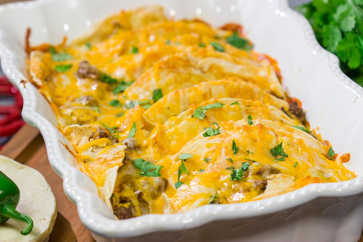 This Beef Enchiladas recipe makes for a fantastic weeknight meal! It's easy to prepare, and it's comfort food at its best!