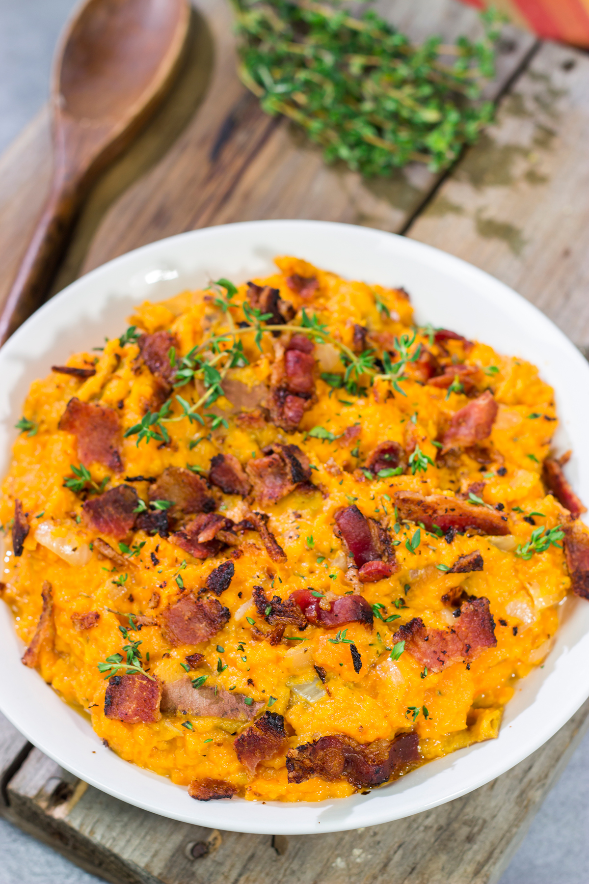 Featuring a sweet and salty combination of flavors, these Mashed Sweet Potatoes with Bacon are an excellent side dish!