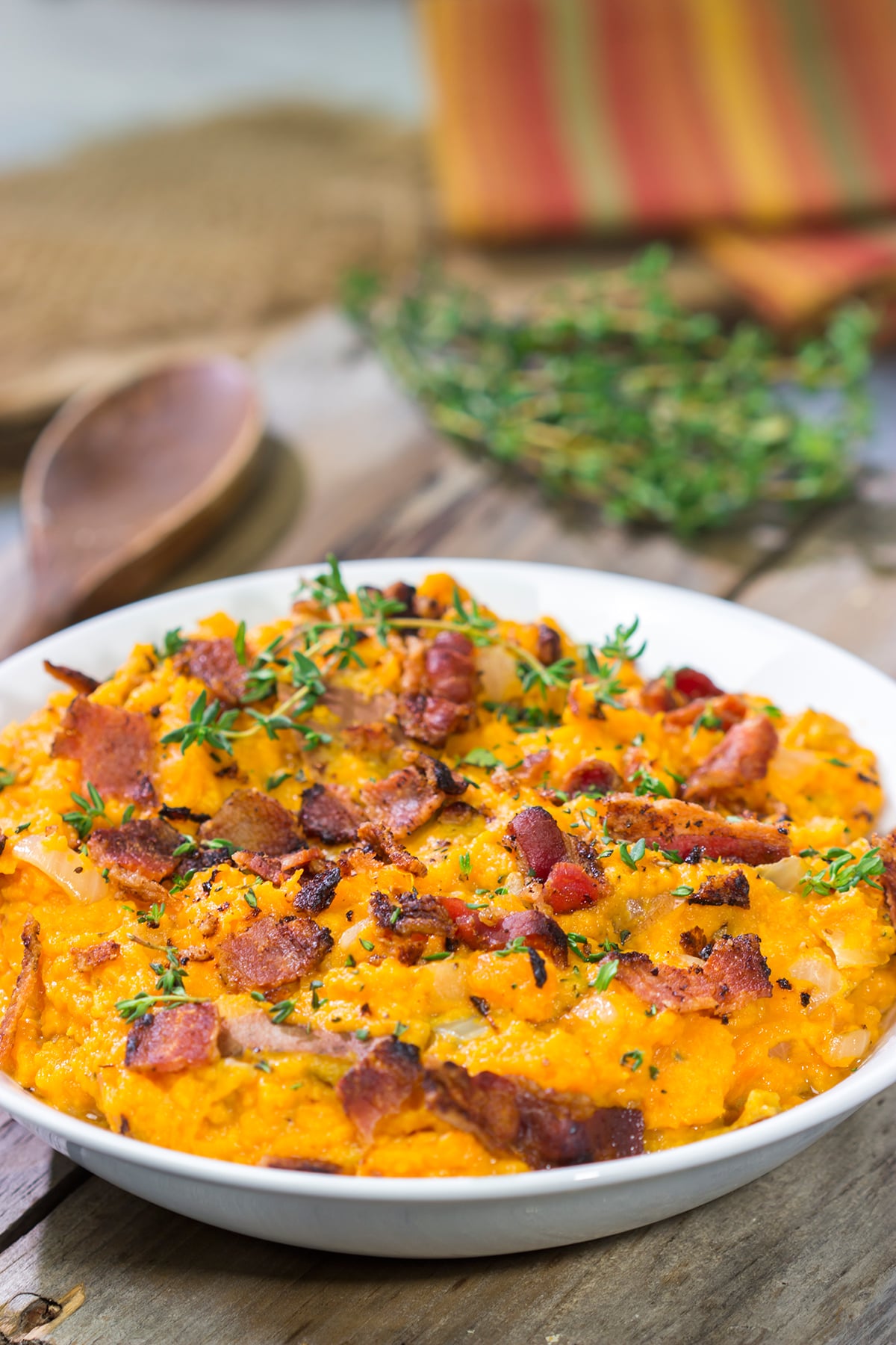 Featuring a sweet and salty combination of flavors, these Mashed Sweet Potatoes with Bacon are an excellent side dish!