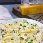 This Slow Cooker Chicken Alfredo recipe only requires about 10 minutes of prep time. It's the perfect comfort food to warm you up on a cold day!