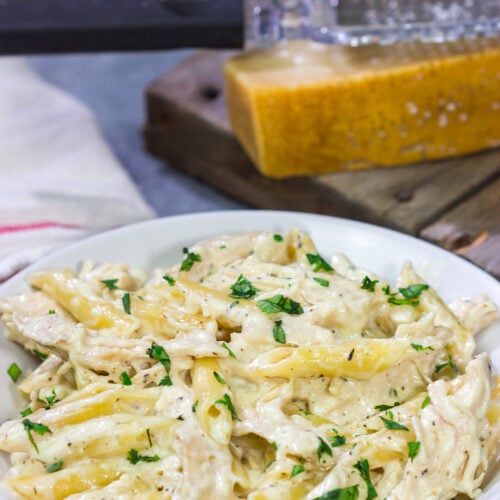 This Slow Cooker Chicken Alfredo recipe only requires about 10 minutes of prep time. It's the perfect comfort food to warm you up on a cold day!