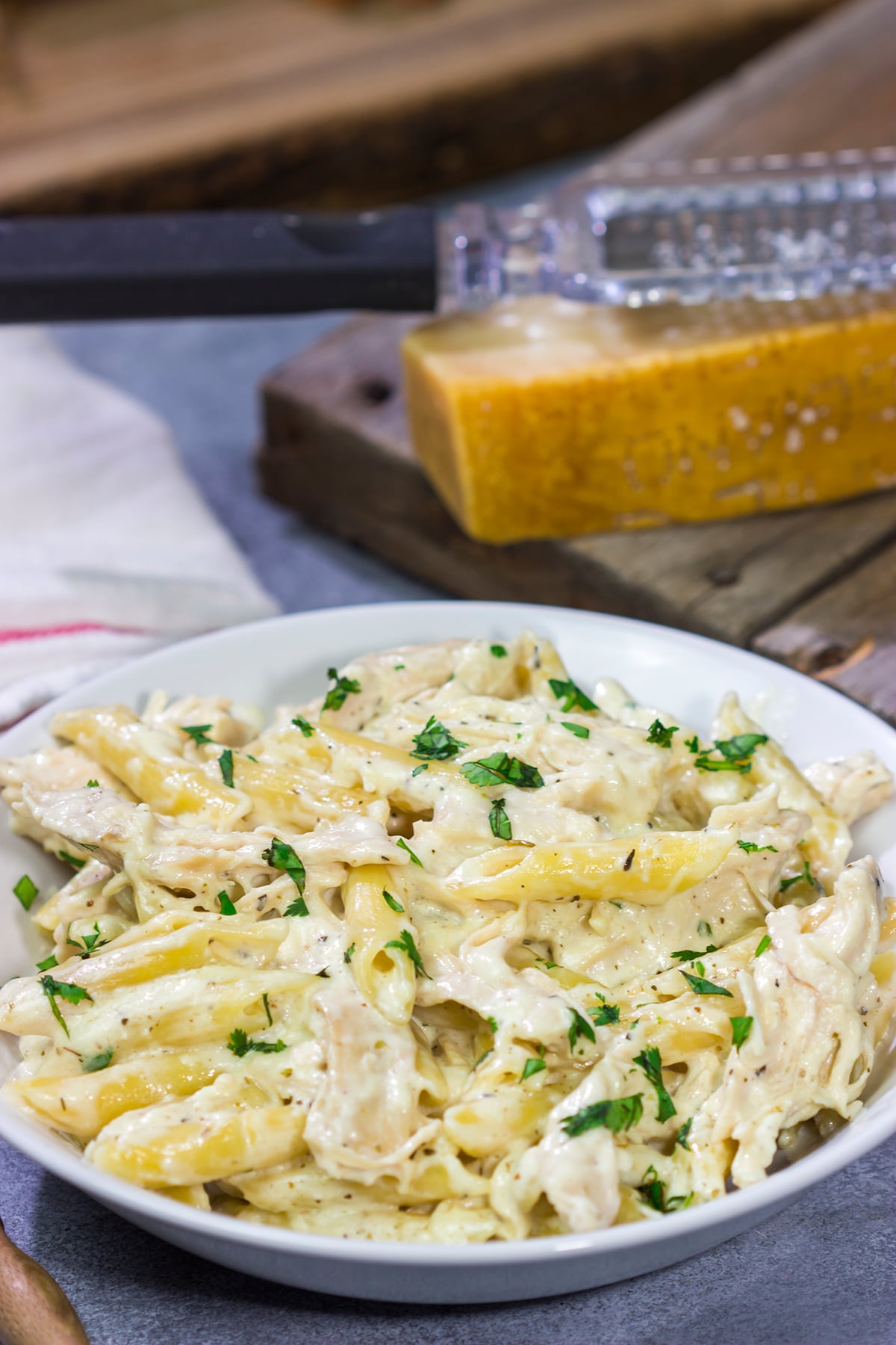 This Slow Cooker Chicken Alfredo recipe only requires about 10 minutes of prep time. It's the perfect comfort food to warm you up on a cold day!
