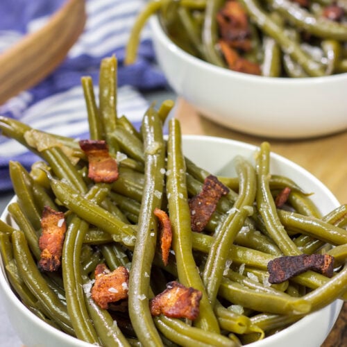 These Slow Cooker Green Beans are an easy and tasty way side dish. They're perfect for Thanksgiving or Christmas...or just a cold winter day!