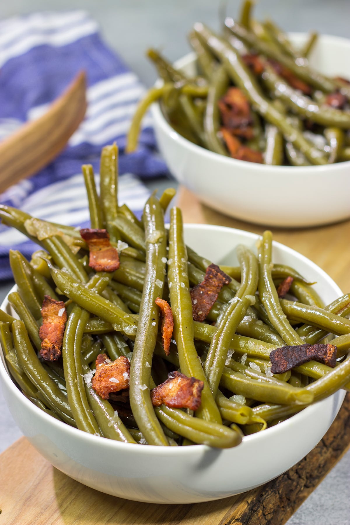 These Slow Cooker Green Beans are an easy and tasty way side dish. They're perfect for Thanksgiving or Christmas...or just a cold winter day!