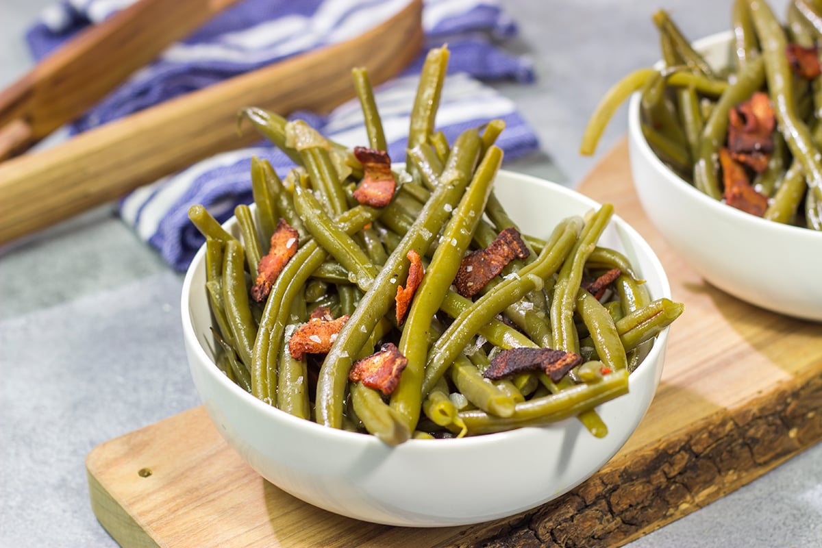 These Slow Cooker Green Beans are an easy and tasty way side dish. They're perfect for Thanksgiving or Christmas...or just a cold winter day!