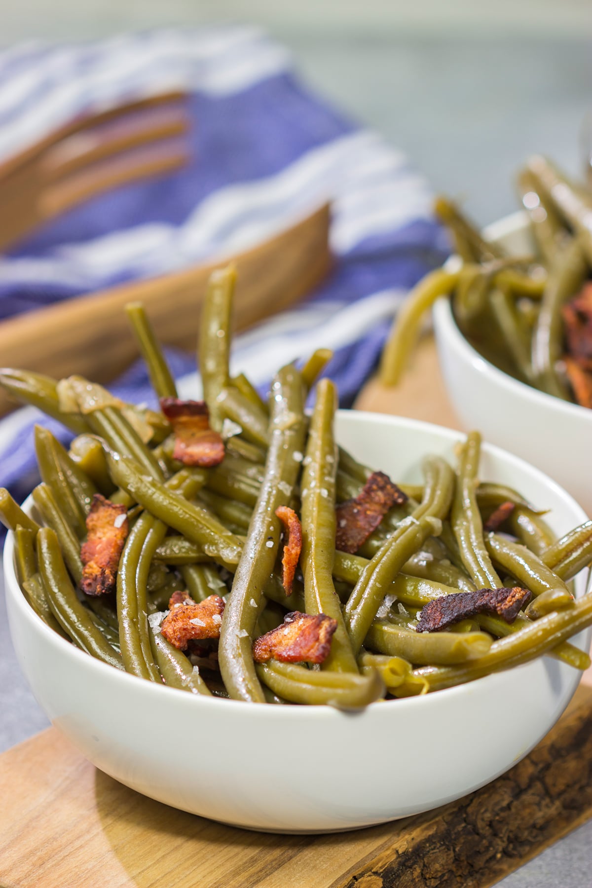 These Slow Cooker Green Beans are an easy and tasty way side dish. They're perfect for Thanksgiving or Christmas...or just a cold winter day!