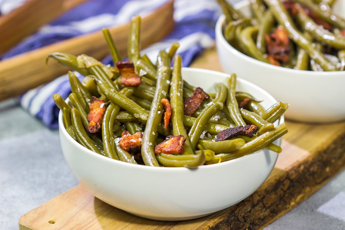 These Slow Cooker Green Beans are an easy and tasty way side dish. They're perfect for Thanksgiving or Christmas...or just a cold winter day!