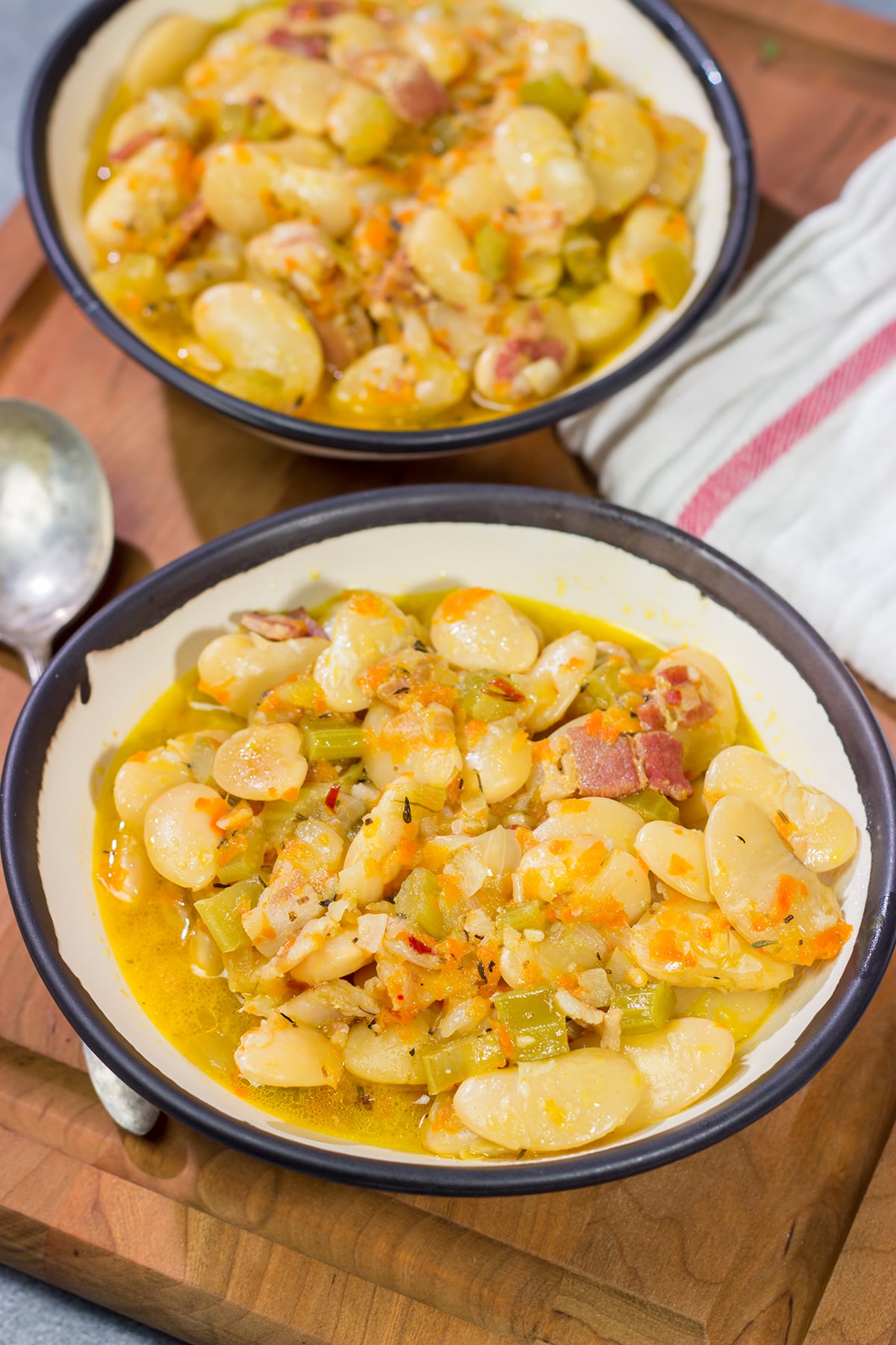 These Southern Lima Beans are cooked from scratch for a meaty, rich flavor. They make for a great side dish any time of the year!
