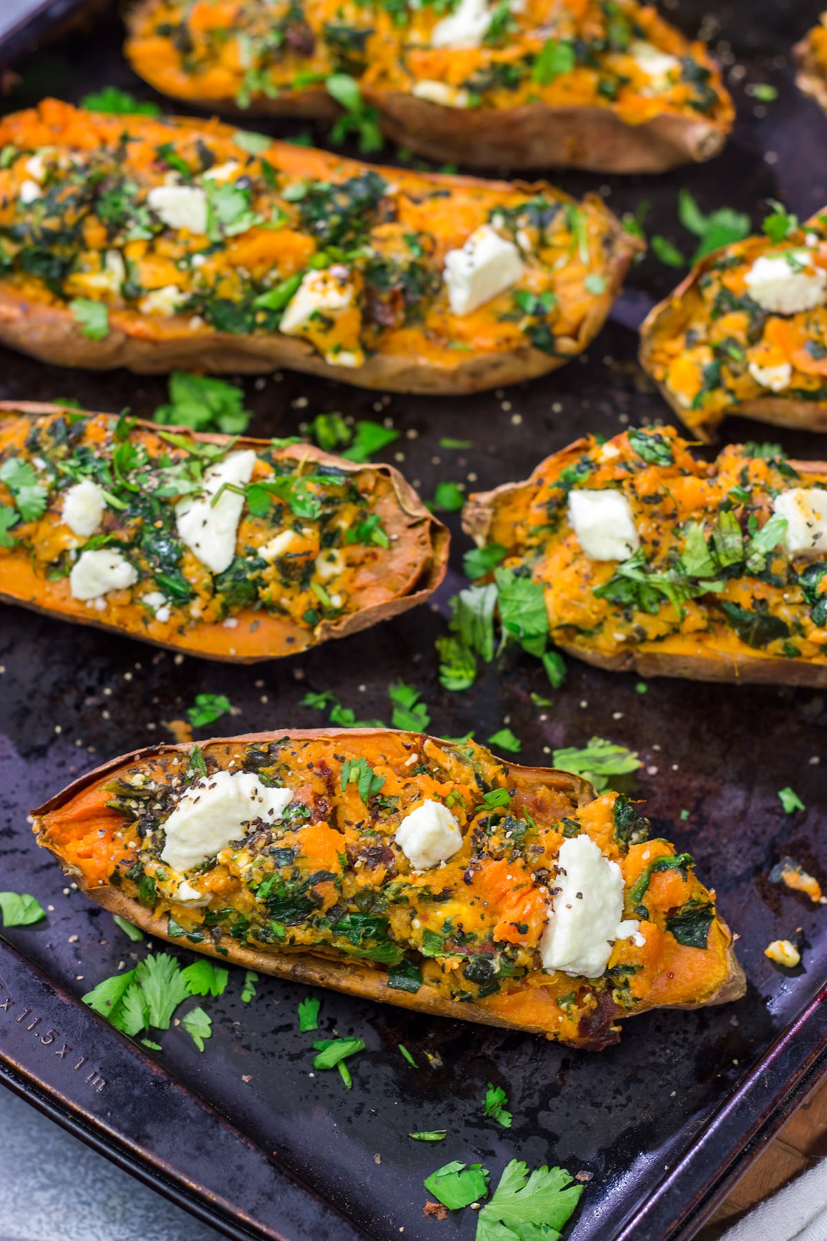These Spinach and Feta Stuffed Sweet Potatoes are flavorful and easy. They're a great side dish when you want to mix things up a bit!