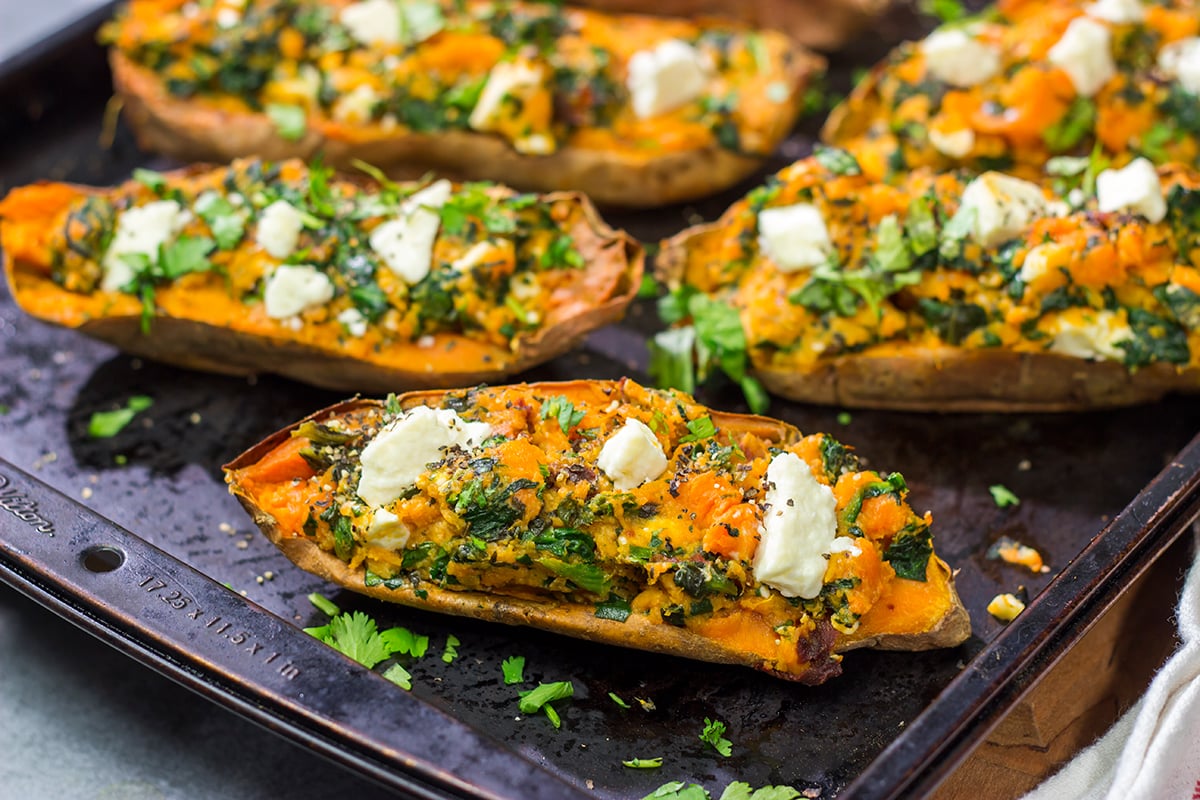 These Spinach and Feta Stuffed Sweet Potatoes are flavorful and easy. They're a great side dish when you want to mix things up a bit!