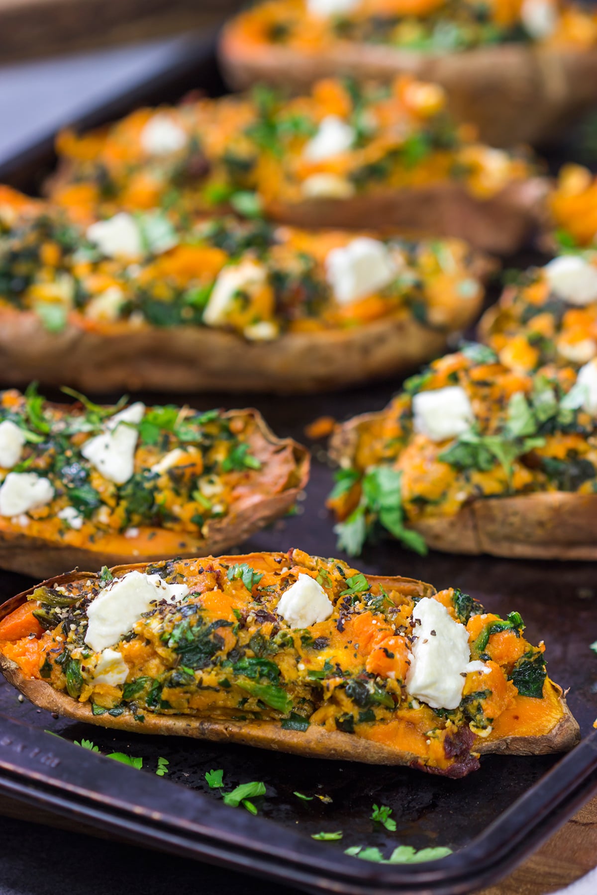 These Spinach and Feta Stuffed Sweet Potatoes are flavorful and easy. They're a great side dish when you want to mix things up a bit!