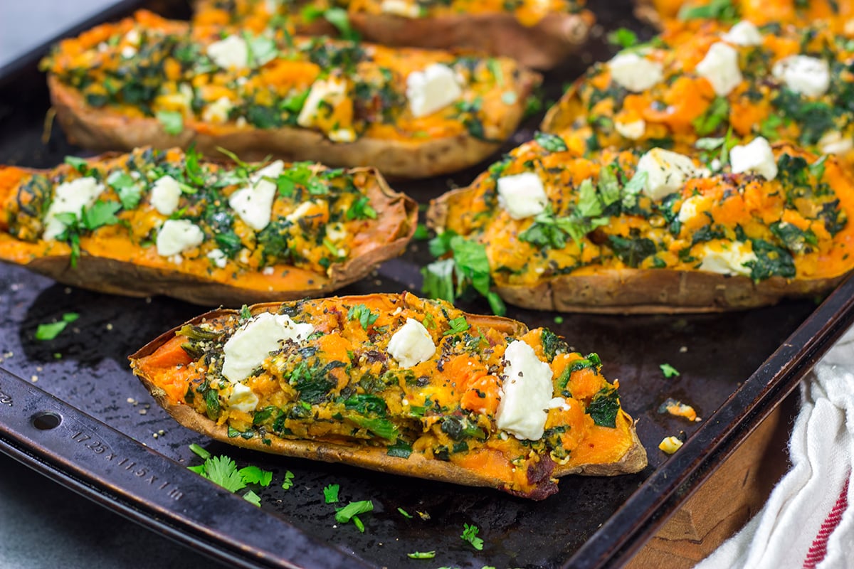 These Spinach and Feta Stuffed Sweet Potatoes are flavorful and easy. They're a great side dish when you want to mix things up a bit!