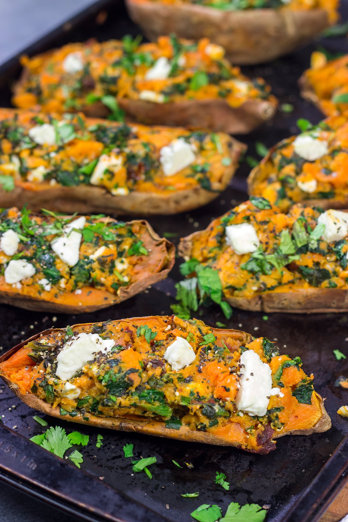 These Spinach and Feta Stuffed Sweet Potatoes are flavorful and easy. They're a great side dish when you want to mix things up a bit!