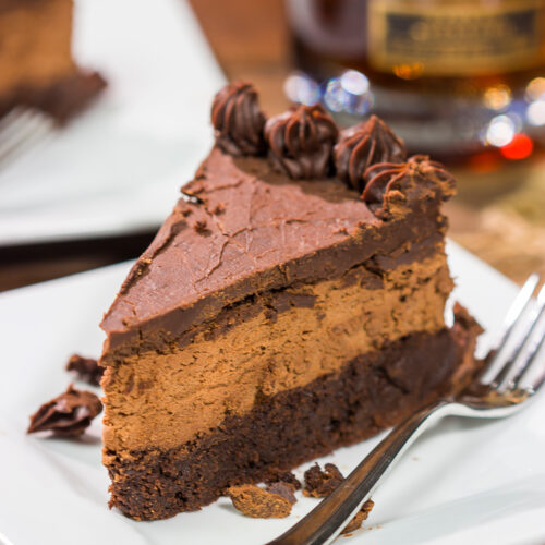 This 3-layer Bourbon Chocolate Mousse Cake is sure to satisfy any chocoholic in your life! Grab a slice for dessert tonight!