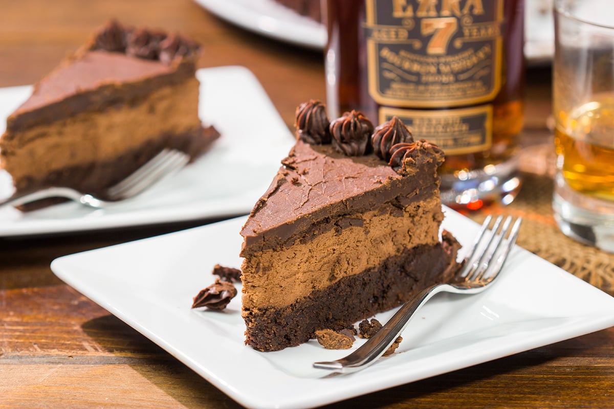 This 3-layer Bourbon Chocolate Mousse Cake is sure to satisfy any chocoholic in your life! Grab a slice for dessert tonight!