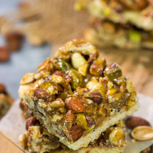 These Caramel Nut Bars feature a mixture of mixed nuts and caramel on top of a buttery shortbread crust. Good luck eating just one!