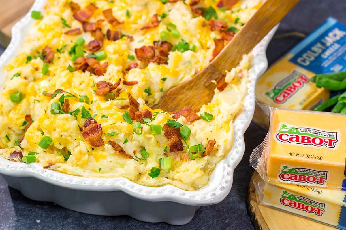 Packed with all of the classic baked potato toppings, this Loaded Mashed Potato Casserole makes for a delicious side dish!