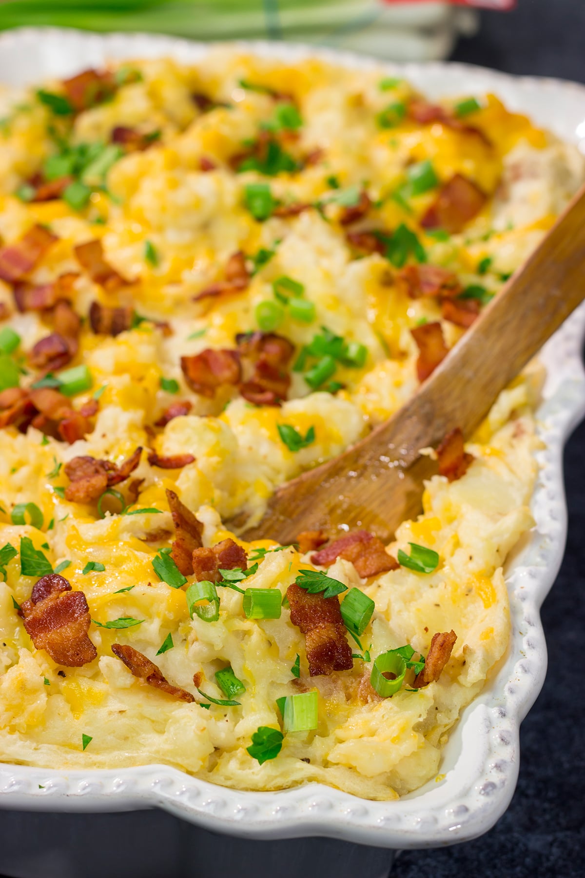 Packed with all of the classic baked potato toppings, this Loaded Mashed Potato Casserole makes for a delicious side dish!