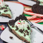 Topped with crushed candy canes and Oreos, this No Bake Mint Chocolate Pie is a fun and easy dessert for the holiday season!