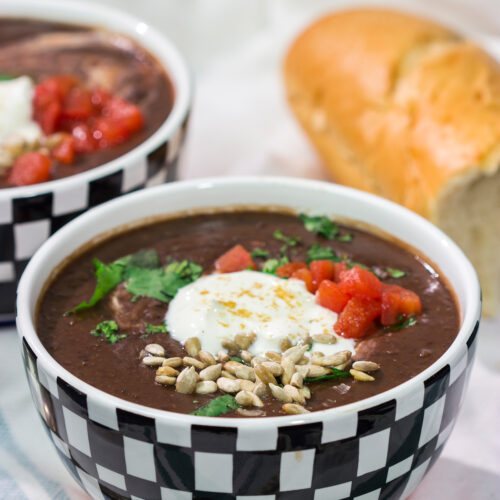 This Slow Cooker Black Bean Soup features the flavors of seasoned black beans...in a creamy soup form. It's delicious on a chilly winter day!