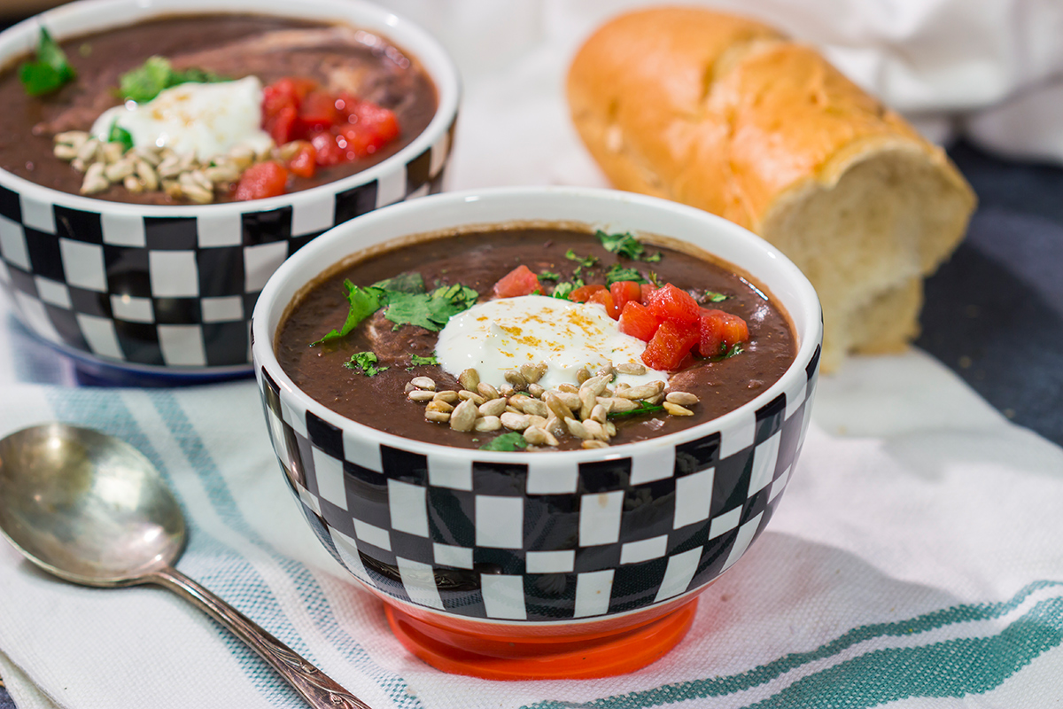 This Slow Cooker Black Bean Soup features the flavors of seasoned black beans...in a creamy soup form. It's delicious on a chilly winter day!