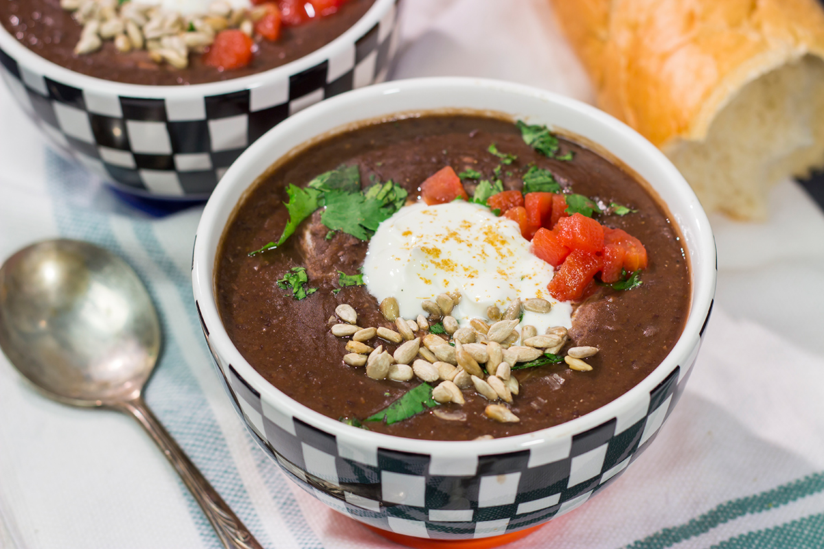 This Slow Cooker Black Bean Soup features the flavors of seasoned black beans...in a creamy soup form. It's delicious on a chilly winter day!
