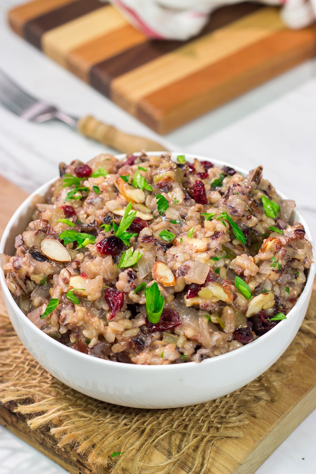 This Slow Cooker Wild Rice recipe is an easy and delicious recipe. It makes for a great side dish for weeknight meals!