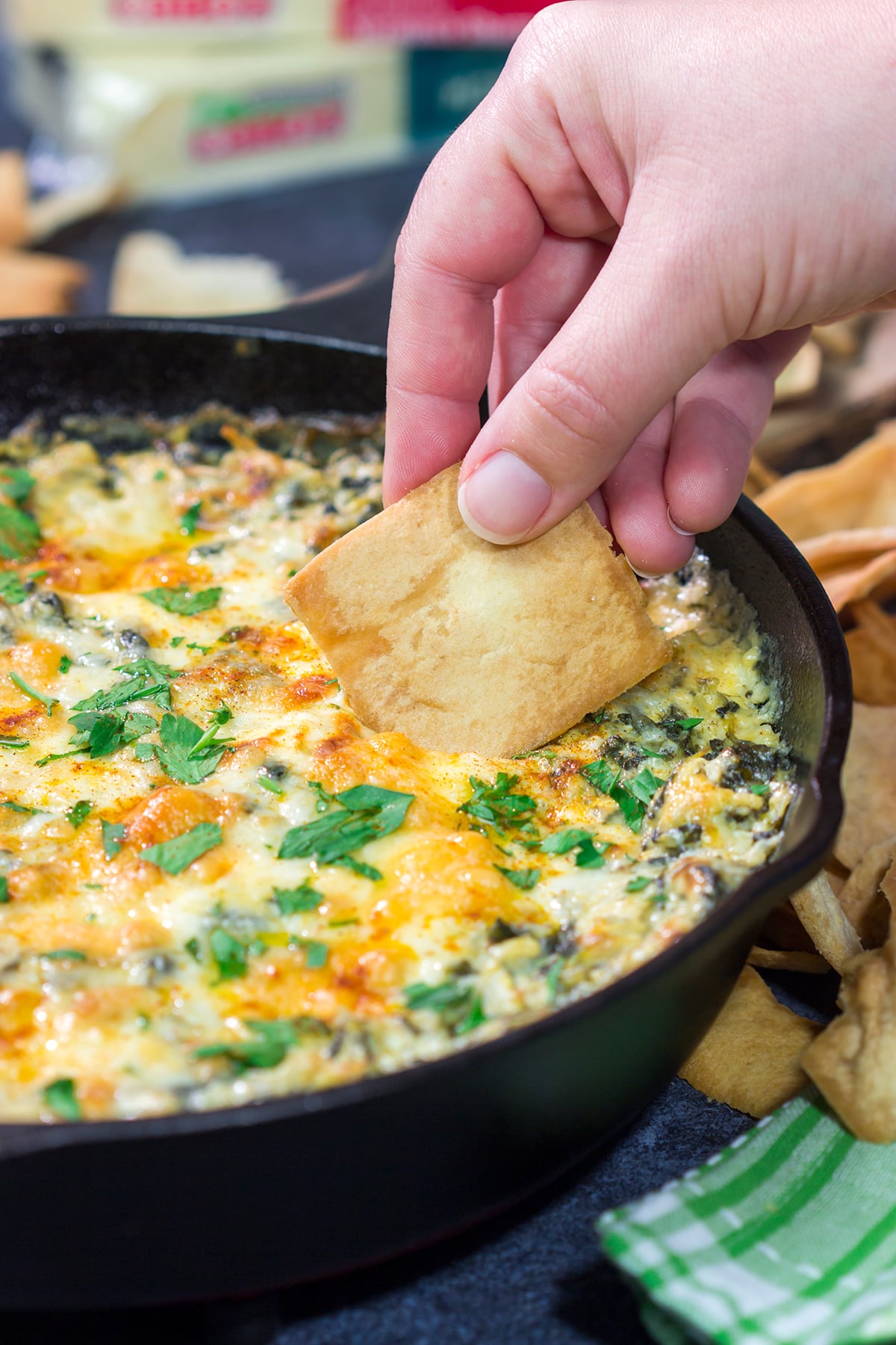 Served in a cast iron skillet, this Baked Spinach Dip is always a crowd-pleaser in our house. It's the perfect appetizer for gamedays!