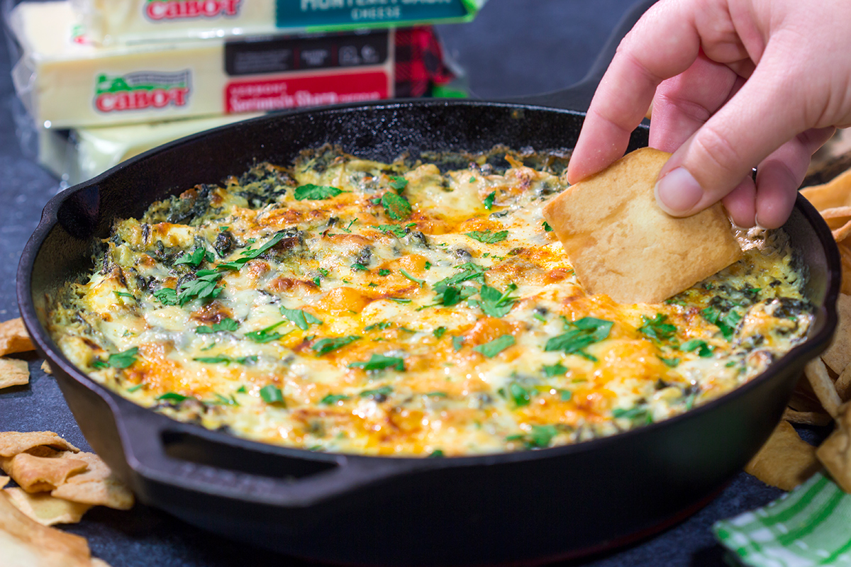 Served in a cast iron skillet, this Baked Spinach Dip is always a crowd-pleaser in our house. It's the perfect appetizer for gamedays!