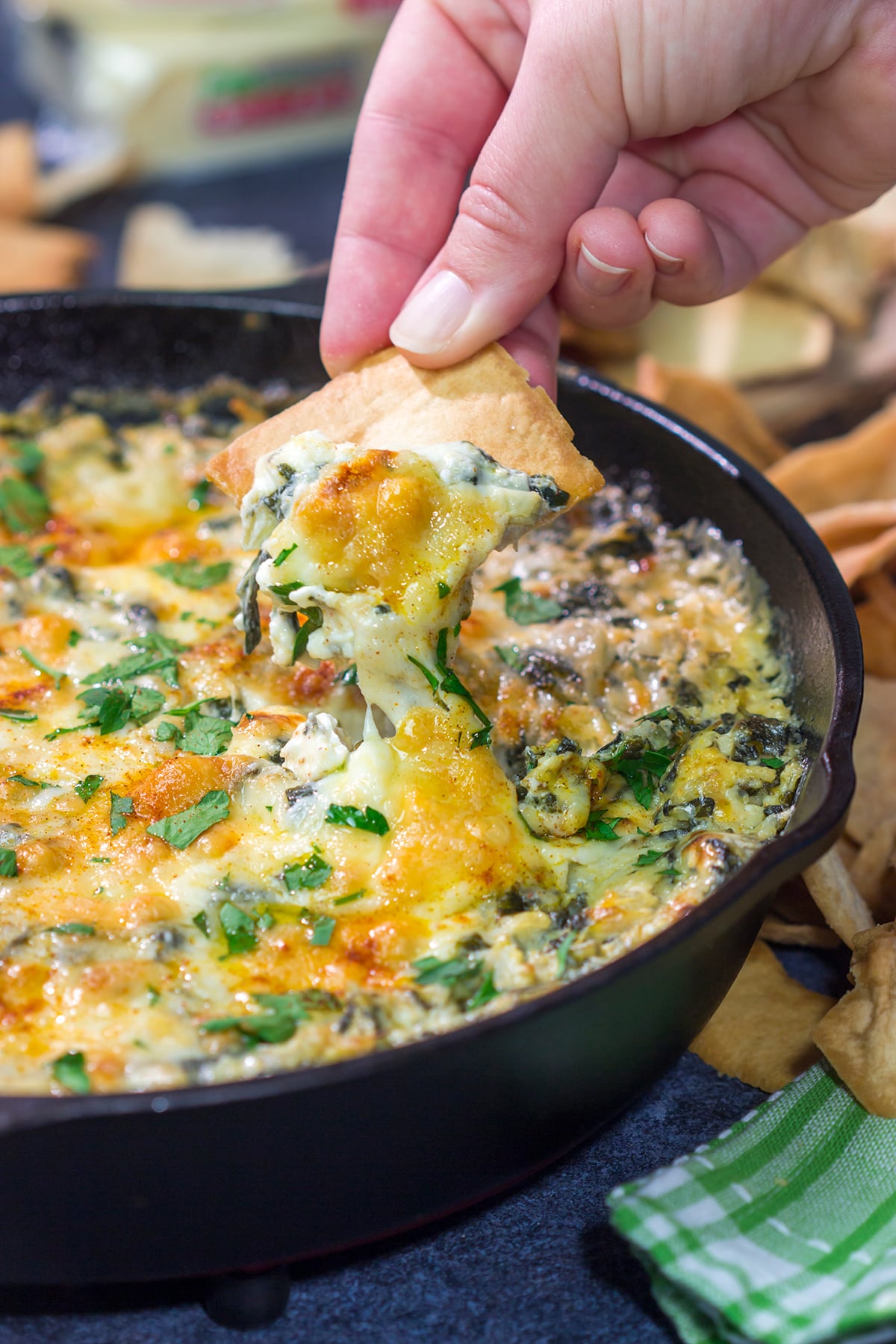 Served in a cast iron skillet, this Baked Spinach Dip is always a crowd-pleaser in our house. It's the perfect appetizer for gamedays!