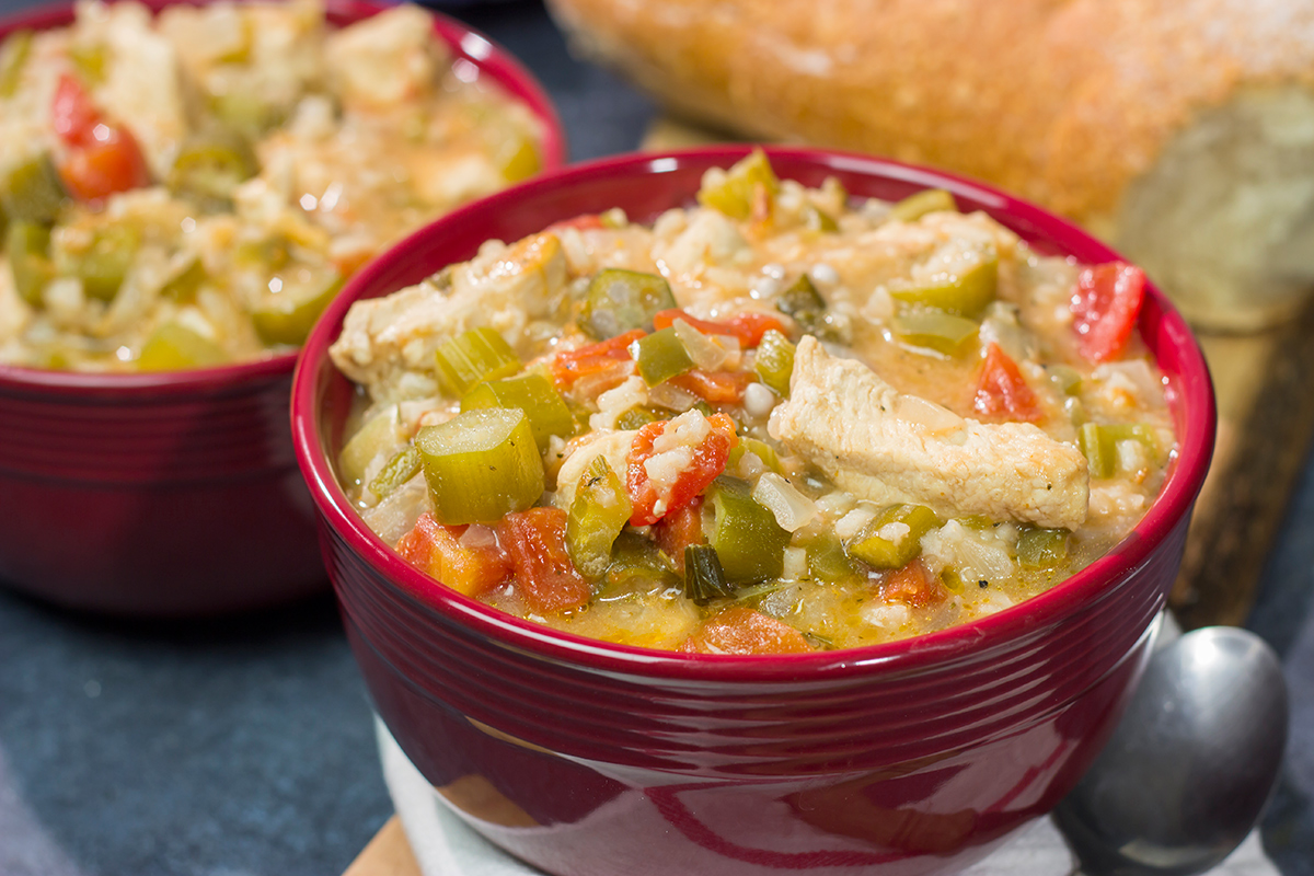 This Chicken Creole Soup features chicken simmered with tomatoes and vegetables. It's a delicious and easy recipe for a winter night!