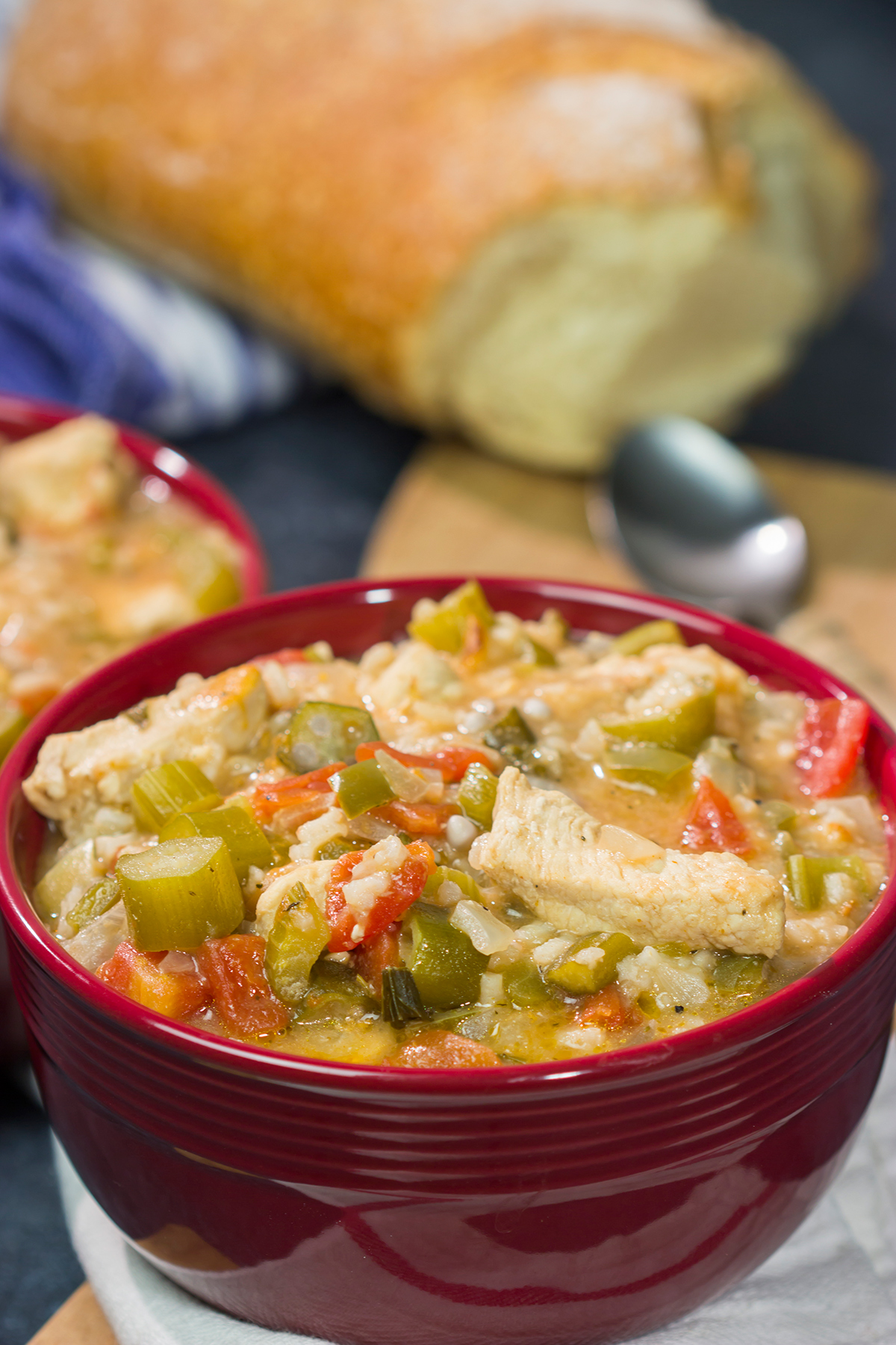 This Chicken Creole Soup features chicken simmered with tomatoes and vegetables. It's a delicious and easy recipe for a winter night!