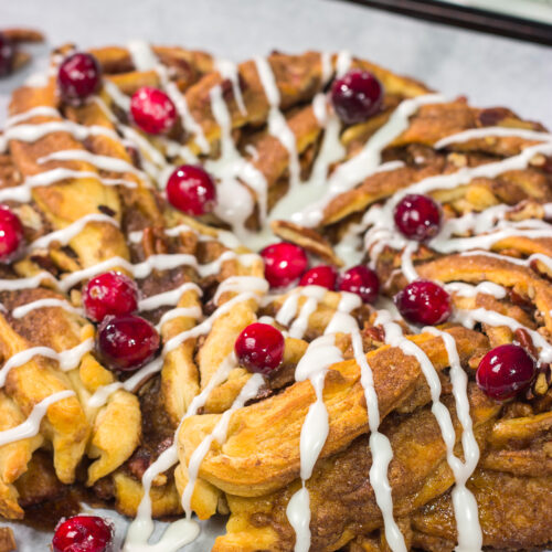 Looking for an easy and delicious holiday breakfast idea? This Easy Cinnamon Pecan Wreath is ready for the oven in just 15 minutes!