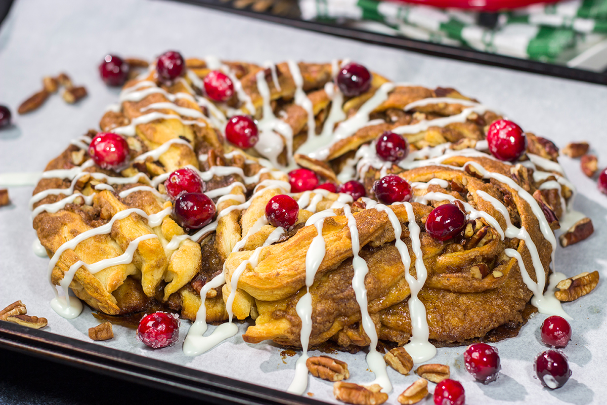 Looking for an easy and delicious holiday breakfast idea? This Easy Cinnamon Pecan Wreath is ready for the oven in just 15 minutes!
