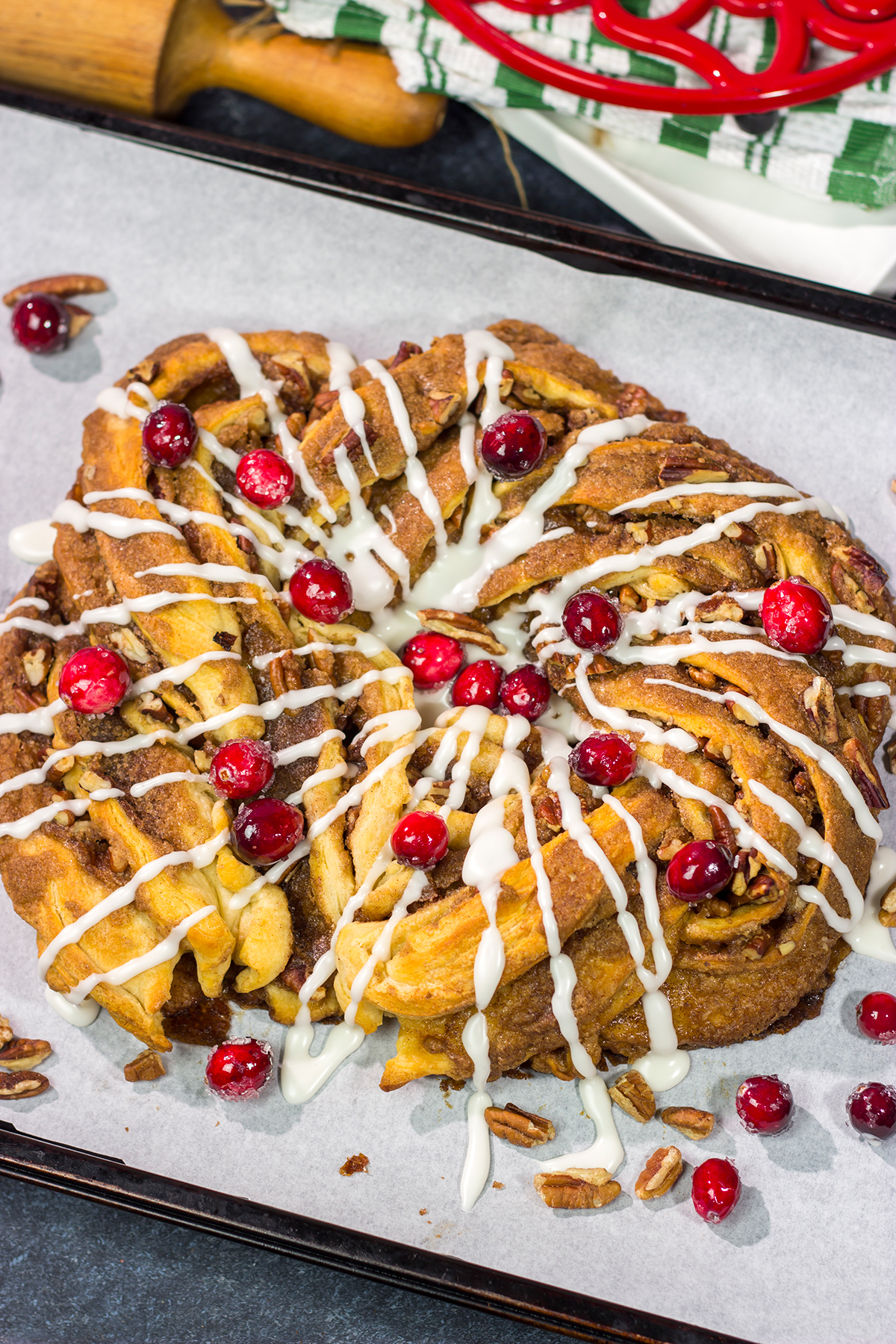 Looking for an easy and delicious holiday breakfast idea? This Easy Cinnamon Pecan Wreath is ready for the oven in just 15 minutes!