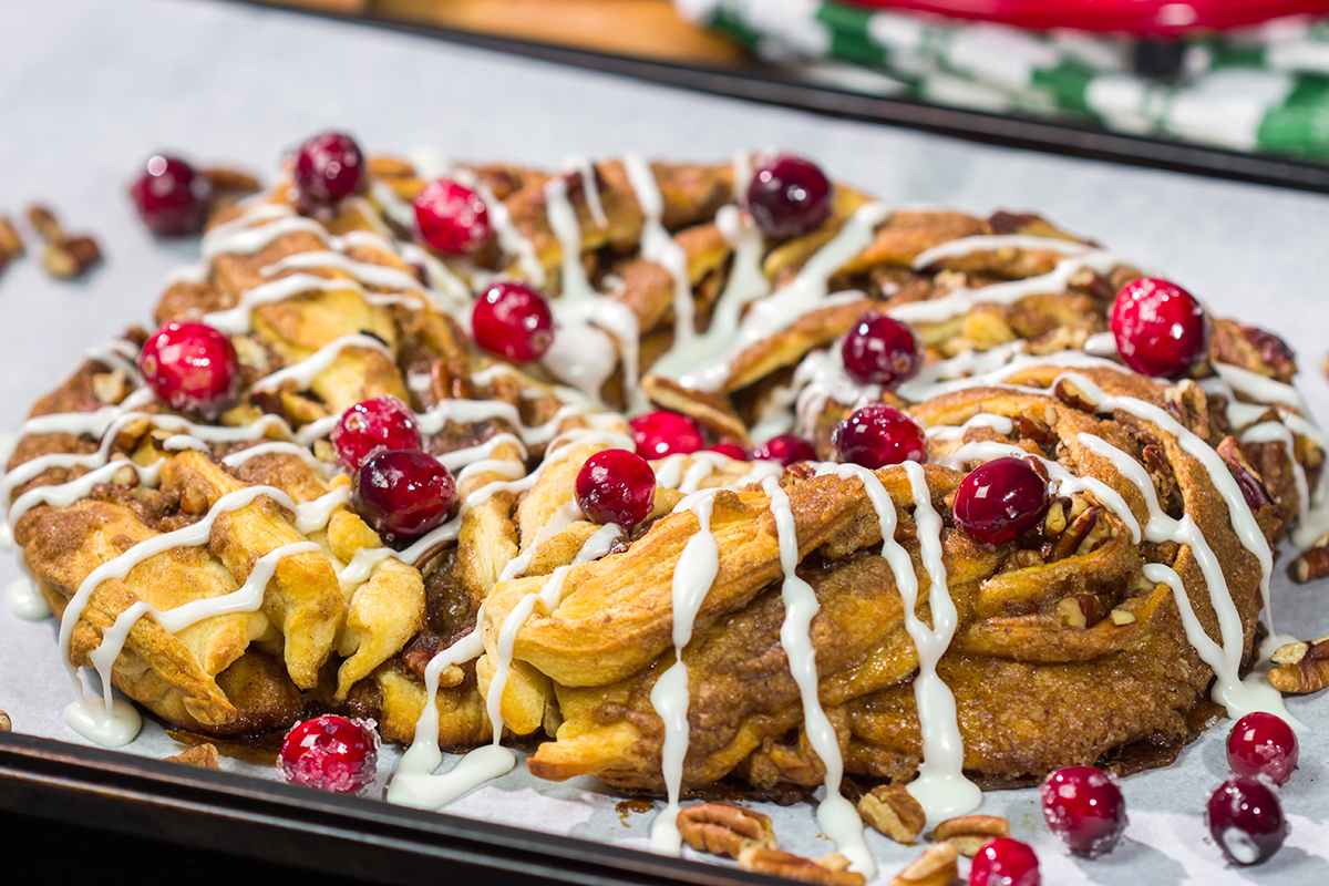 Looking for an easy and delicious holiday breakfast idea? This Easy Cinnamon Pecan Wreath is ready for the oven in just 15 minutes!