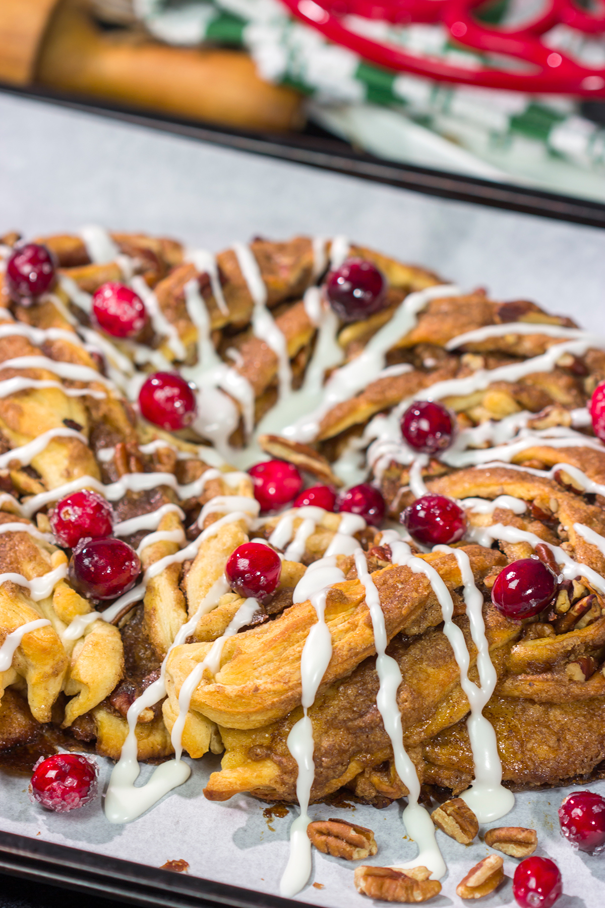 Looking for an easy and delicious holiday breakfast idea? This Easy Cinnamon Pecan Wreath is ready for the oven in just 15 minutes!
