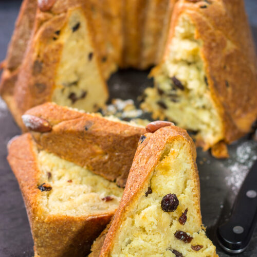 Featuring rum or kirsch-soaked raisins, whole almonds and a dusting of confectioner's sugar, this traditional Kugelhopf recipe makes for a fantastic holiday treat!