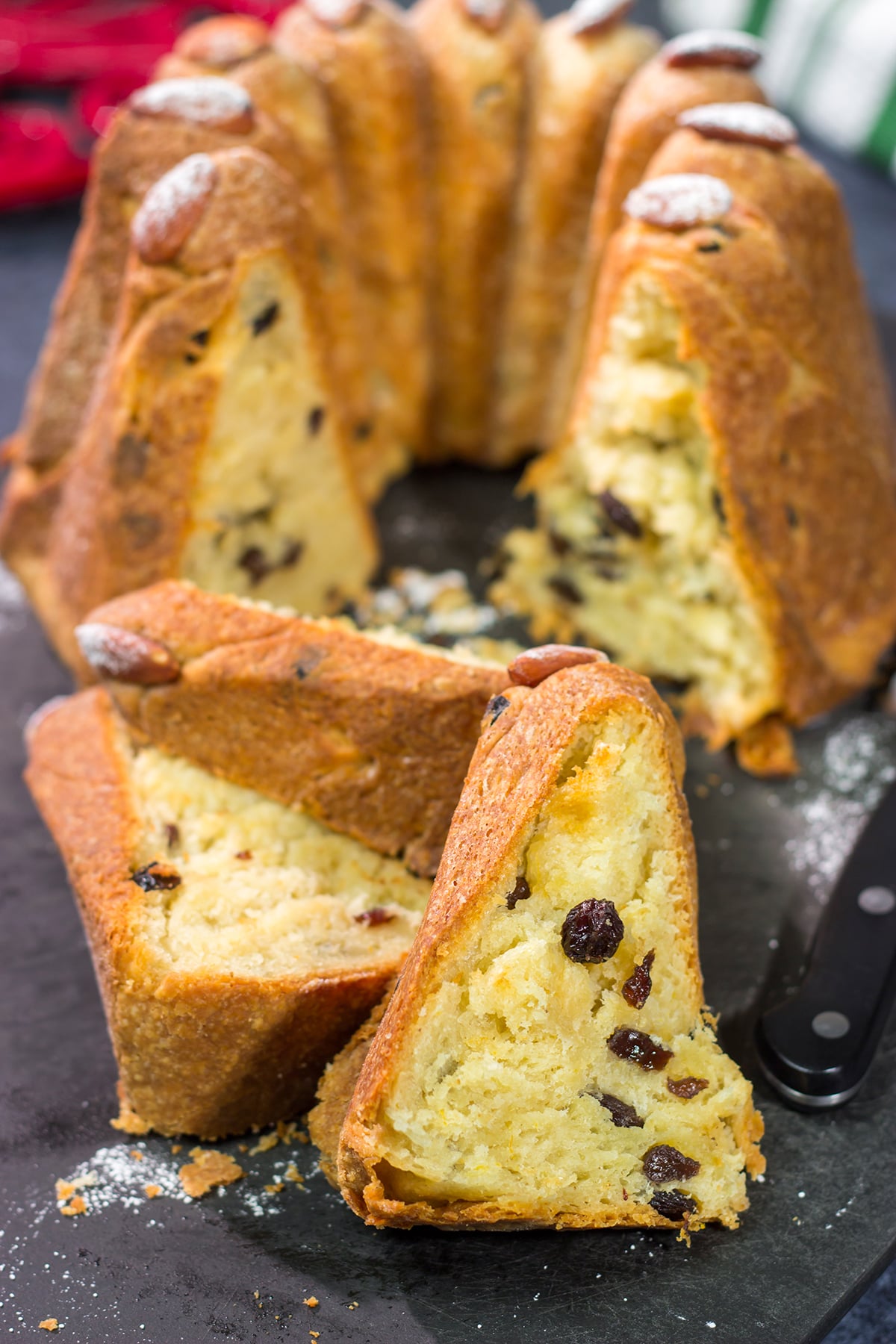 Featuring rum or kirsch-soaked raisins, whole almonds and a dusting of confectioner's sugar, this traditional Kugelhopf recipe makes for a fantastic holiday treat!