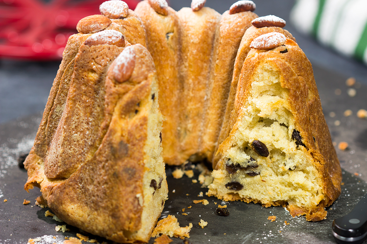 Featuring rum or kirsch-soaked raisins, whole almonds and a dusting of confectioner's sugar, this traditional Kugelhopf recipe makes for a fantastic holiday treat!