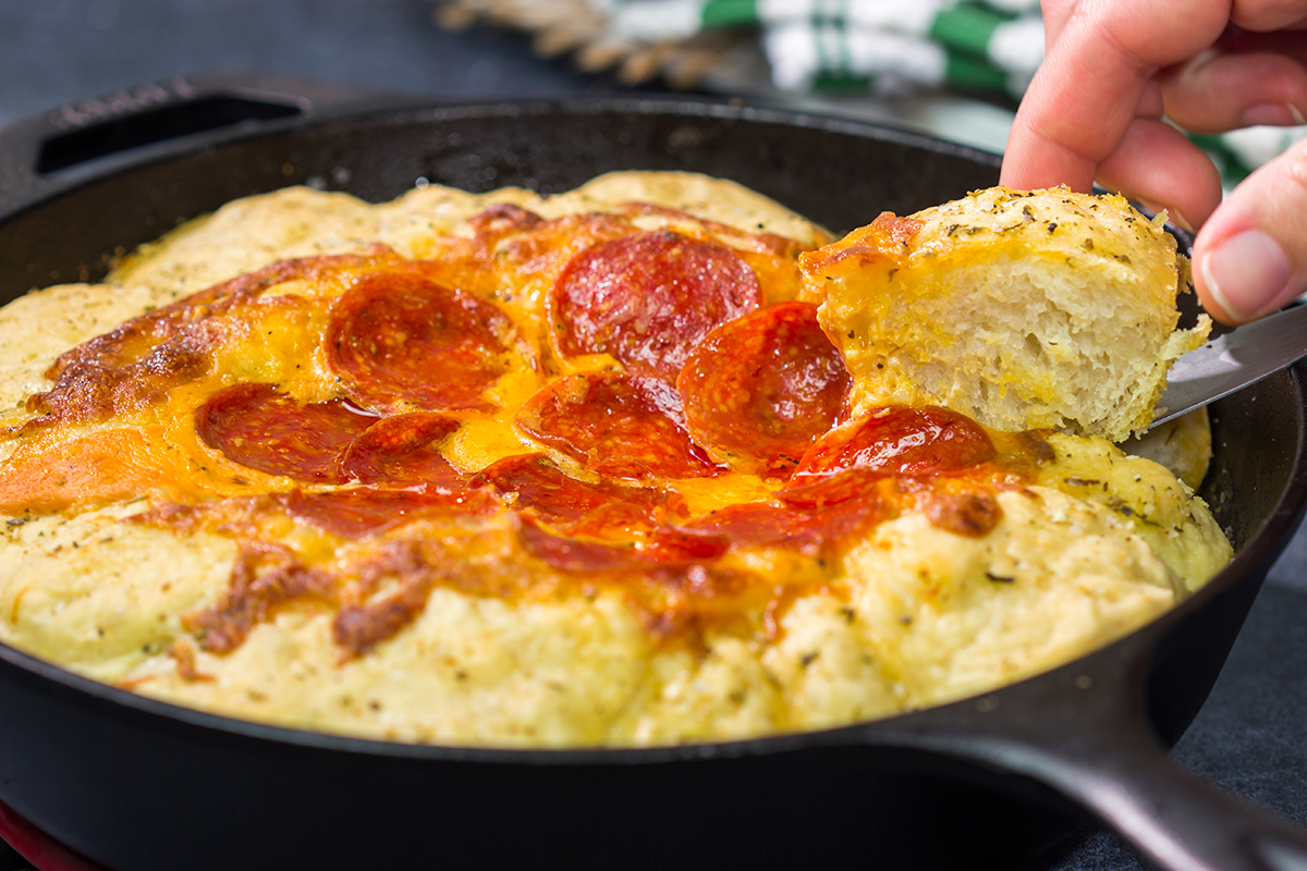 This Pepperoni Pizza Dip features all of the classic pizza flavors...in dip form. It's a great game day appetizer to share with friends!