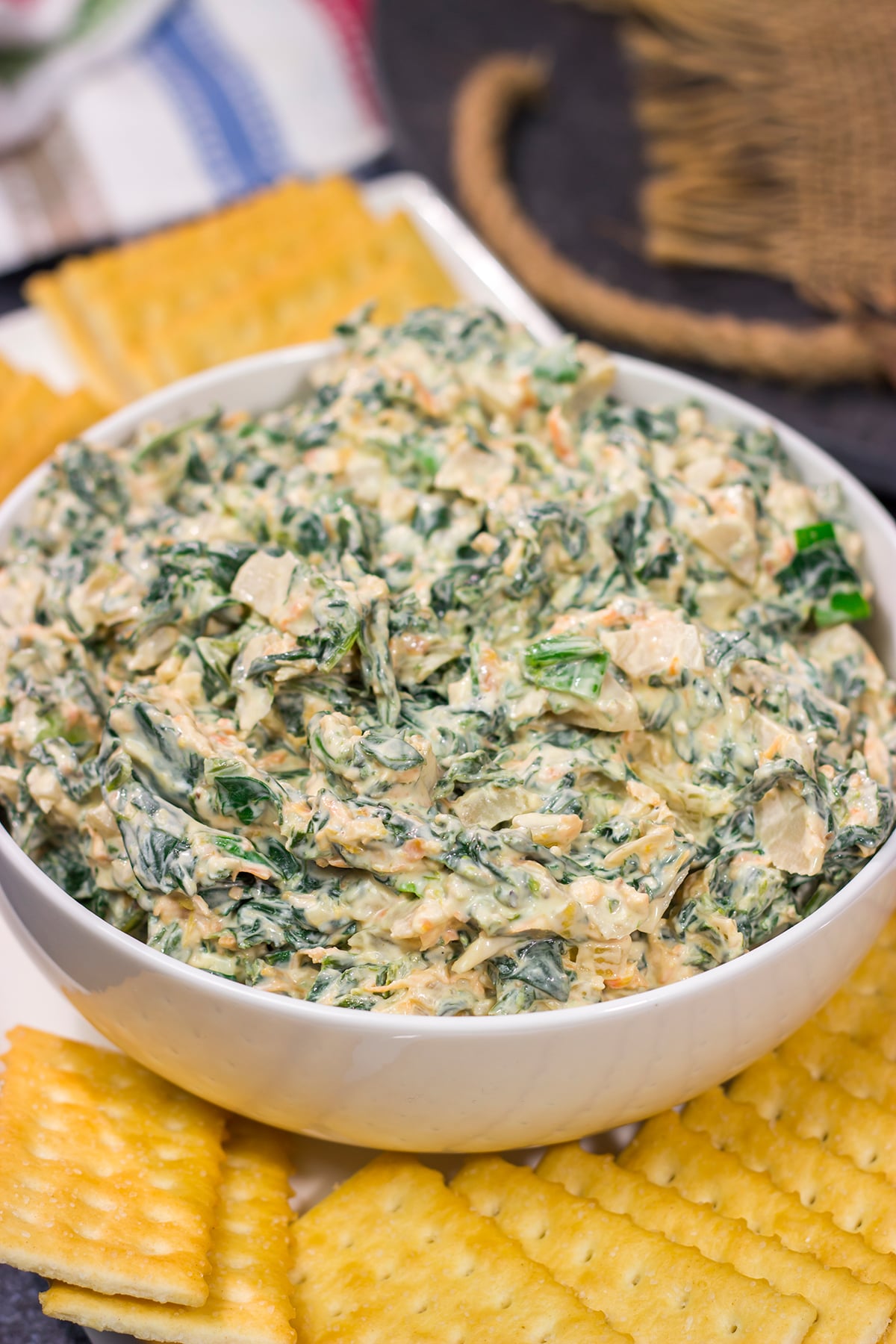 Made with fresh baby spinach, this Fresh Spinach Dip is an easy and delicious appetizer recipe. Grab some fresh veggies or crackers and dig in!