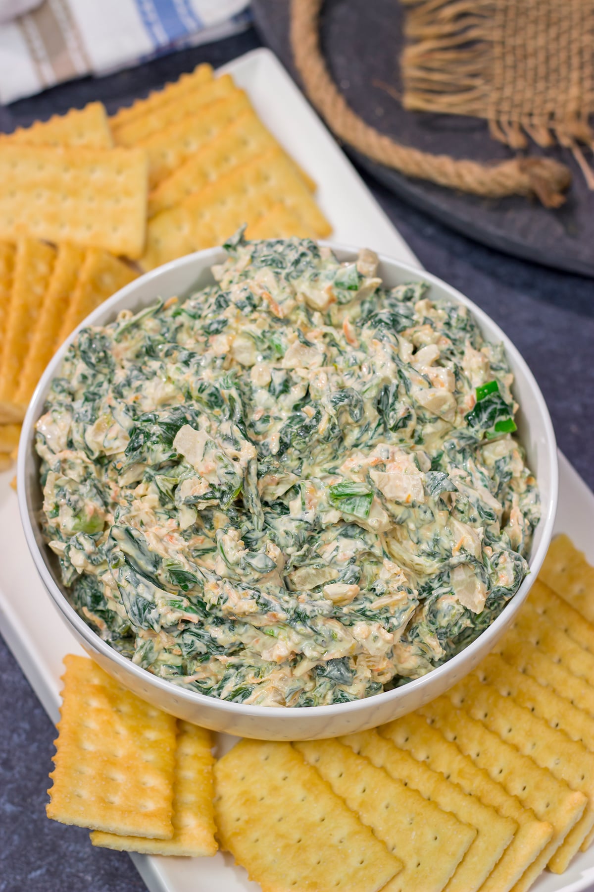 Made with fresh baby spinach, this Fresh Spinach Dip is an easy and delicious appetizer recipe. Grab some fresh veggies or crackers and dig in!