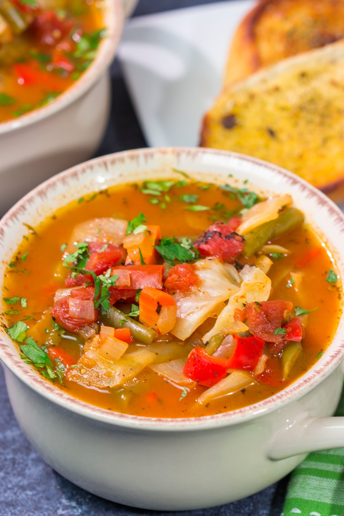 Looking for a healthy and tasty soup recipe? Grab a head of cabbage! This Healthy Cabbage Soup is a great way to warm up on a cold day!