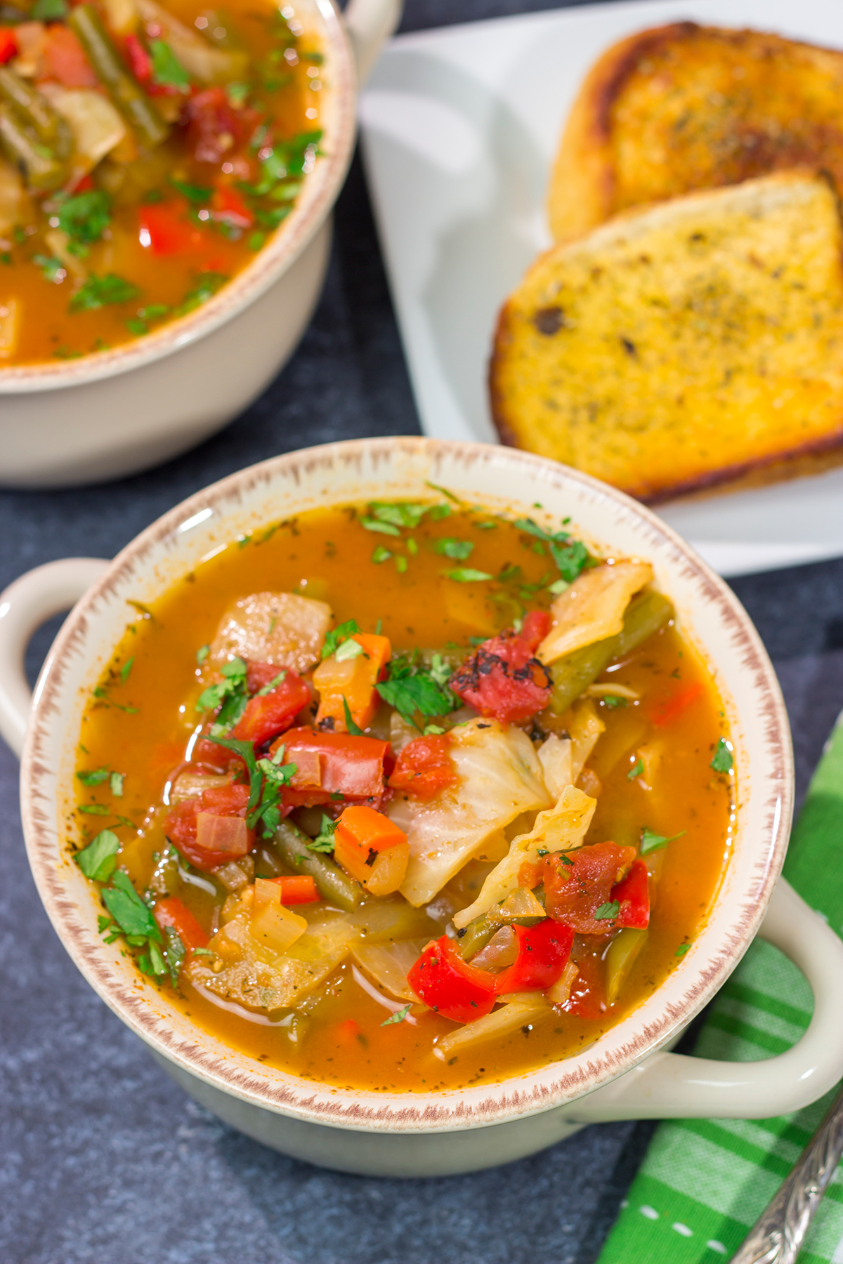Looking for a healthy and tasty soup recipe? Grab a head of cabbage! This Healthy Cabbage Soup is a great way to warm up on a cold day!