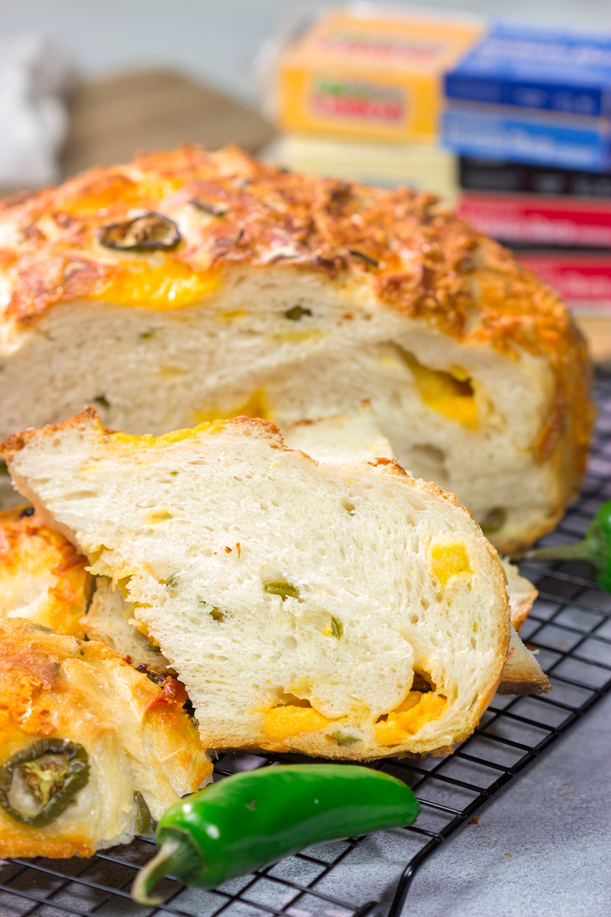 This Jalapeno Cheddar Bread features chunks of cheddar cheese and diced jalapenos mixed into a classic rustic bread. This bread makes fantastic grilled cheese sandwiches!!