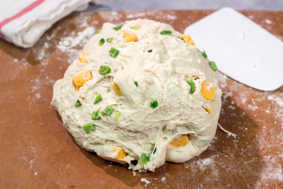 This Jalapeno Cheddar Bread features chunks of cheddar cheese and diced jalapenos mixed into a classic rustic bread. This bread makes fantastic grilled cheese sandwiches!!
